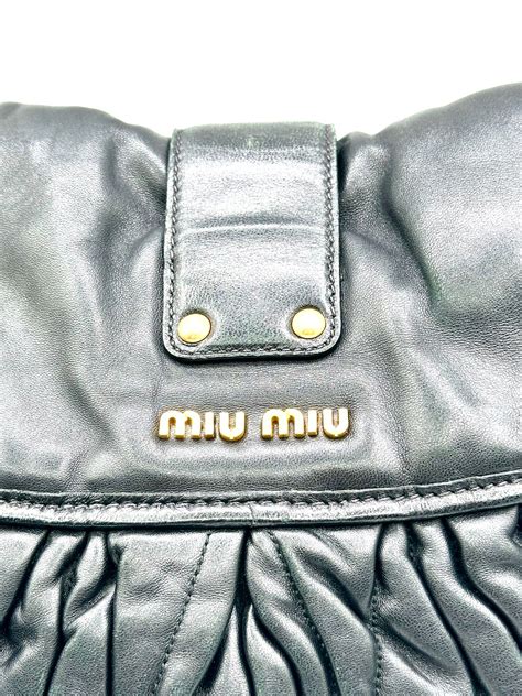 bolso miu miu precio|Bolsos y carteras de diseño .